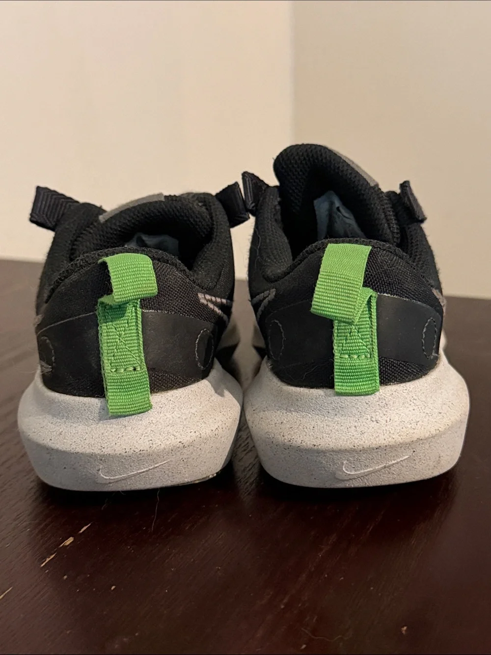 Nike Black Sneakers with Green Accents for Kids